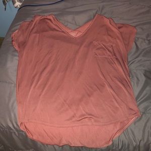 Rose gold short sleeve shirt.
